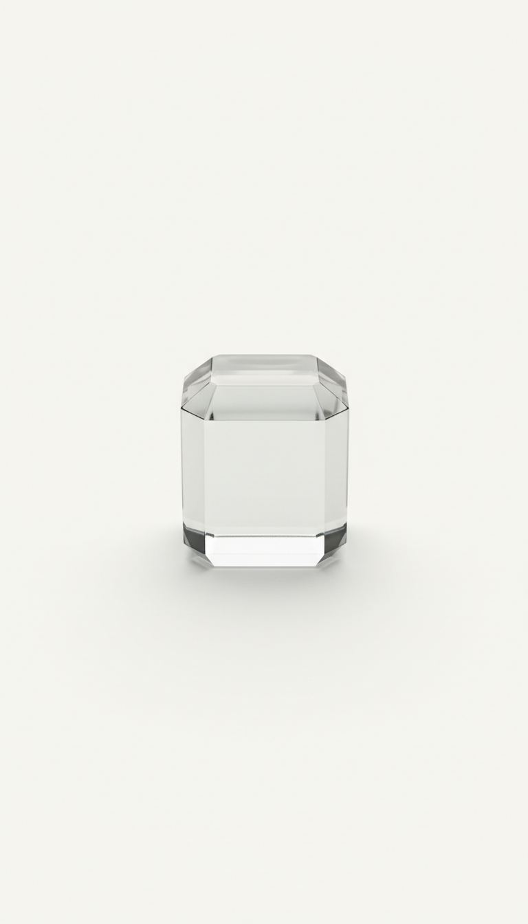 Crystal-clear glass paperweight faceted design